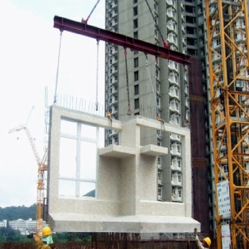 Charred Shingle Exterior Complementing Precast Concrete Design for Urban Resilience