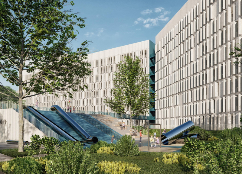Charred Wooden Shingles and Glass Facades in a Multifunctional Residential Building