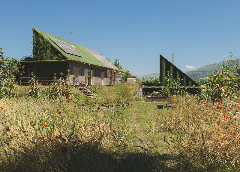 Charred Wooden Shingles and High-Performance Insulation Define Sustainable Living Spaces