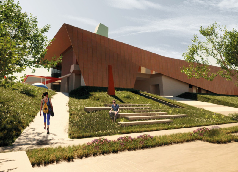 Weathered Cortén Facade Overlooking Natural Landscapes in a Multifunctional Community Center