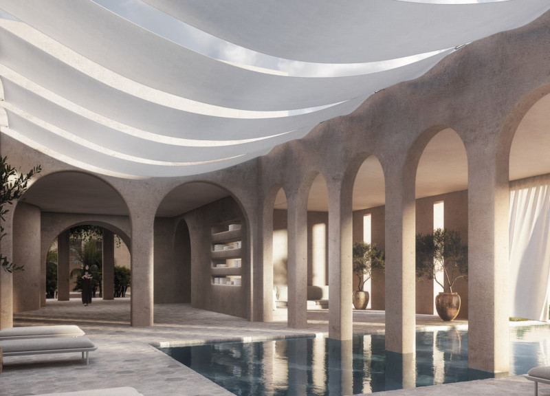 Natural Stone Facades and Palm Wood Elements Foster Sustainable Living in Desert Community