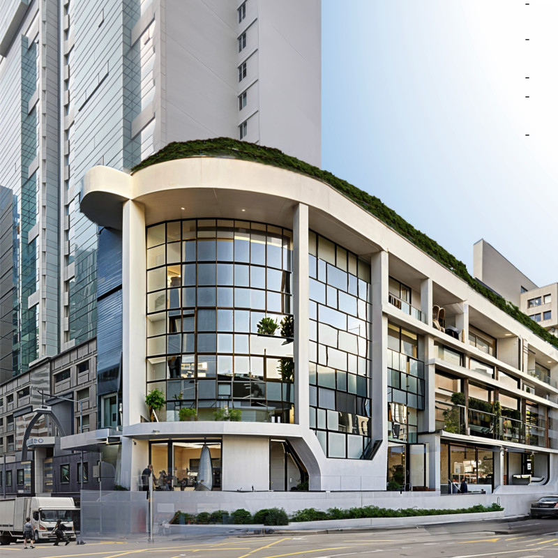 Charred Wooden Shingles and Vertical Gardens in a Sustainable Community Hub Design