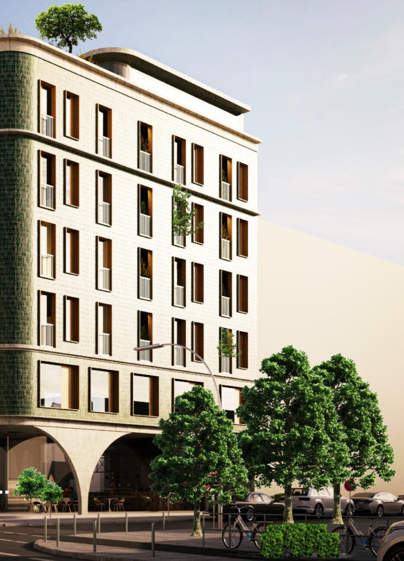 Charred Wooden Shingles and Natural Light Define a Versatile Mixed-Use Structure