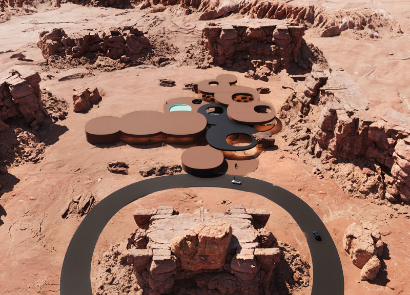 Circular Forms of Cast Concrete and Glass Harmonizing with Desert Landscape for Luxurious Hospitality