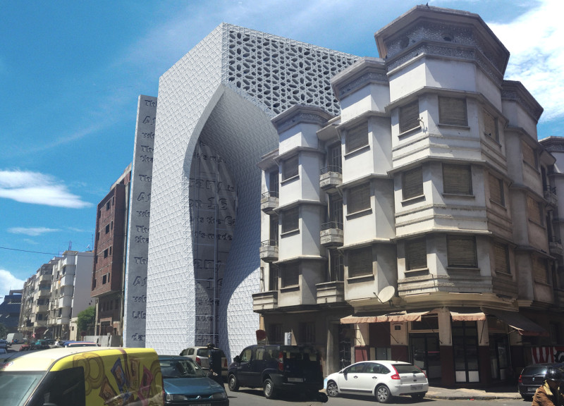 Lattice Facade and Memory Wall Define a Community Library in Natural Materials