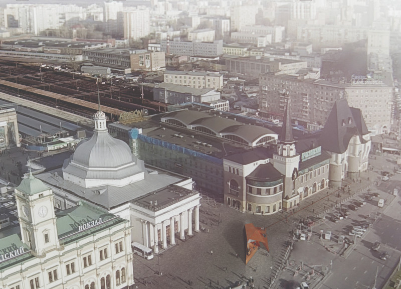 Reflective Aluminum Kiosks Enhanced by Cast Iron and Local Heritage in Siberian Transit Spaces