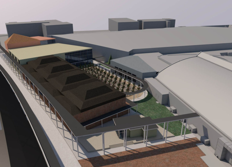 Charred Wood Integrating Natural Light in a Multi-Use Exhibition Facility