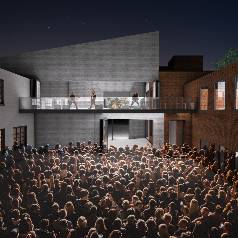 Charred Wooden Shingles and Historic Brick Form a Multifunctional Cultural Hub