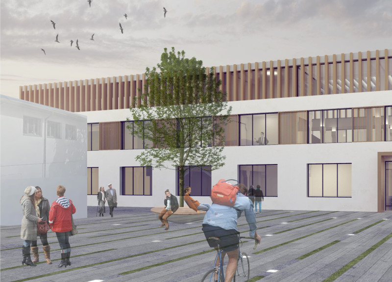 Brick Heritage and Glass Facades Revitalizing an Industrial Space for Community Engagement