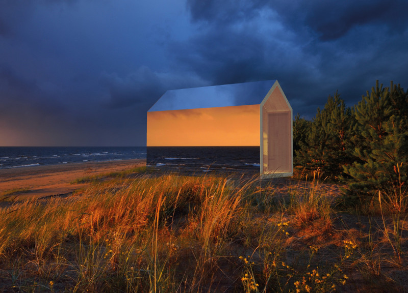 Reflective Aluminum Cabins Crafted from Timber and Engineered for Coastal Retreats