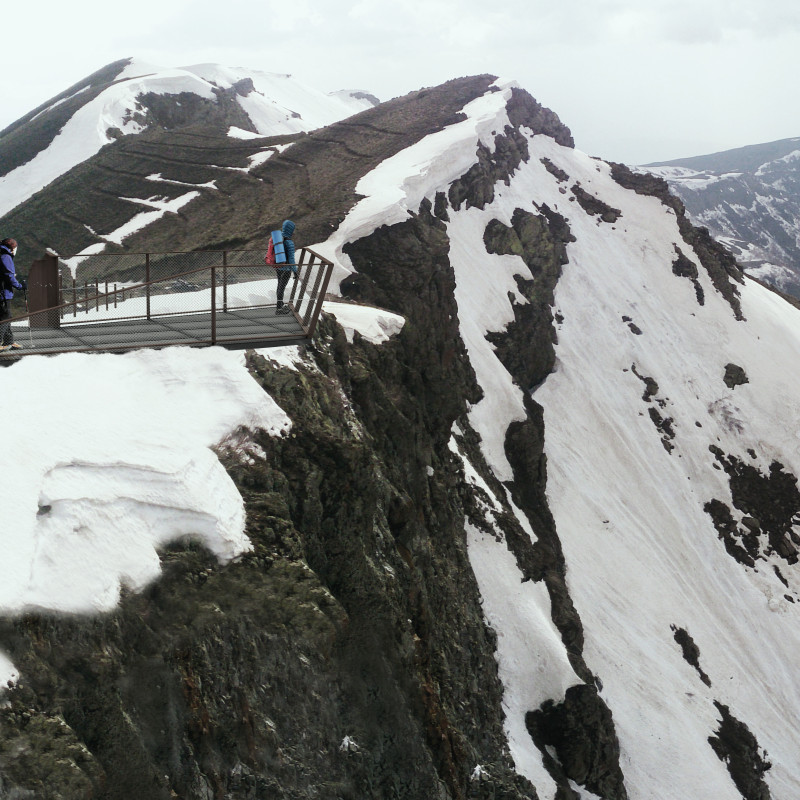 Corten Steel Struts Frame a 360-Degree Observation Platform Above Volcanic Terrain