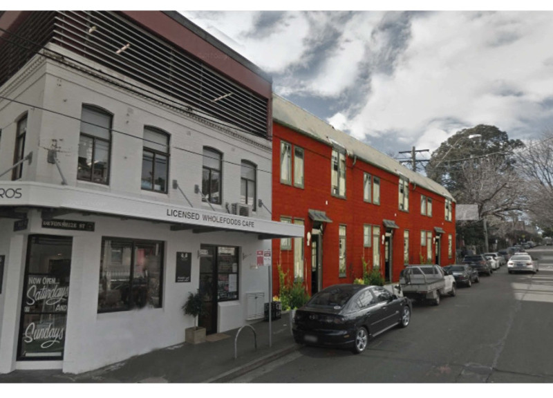 Charred Wooden Shingles and Cellulose Insulation in Community-Centric Modular Housing