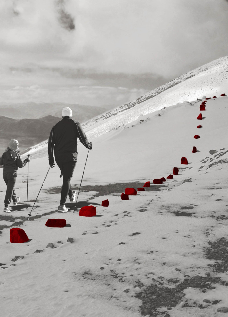 Crimson Pathways and Local Stone Lookouts in a Volcanic Landscape