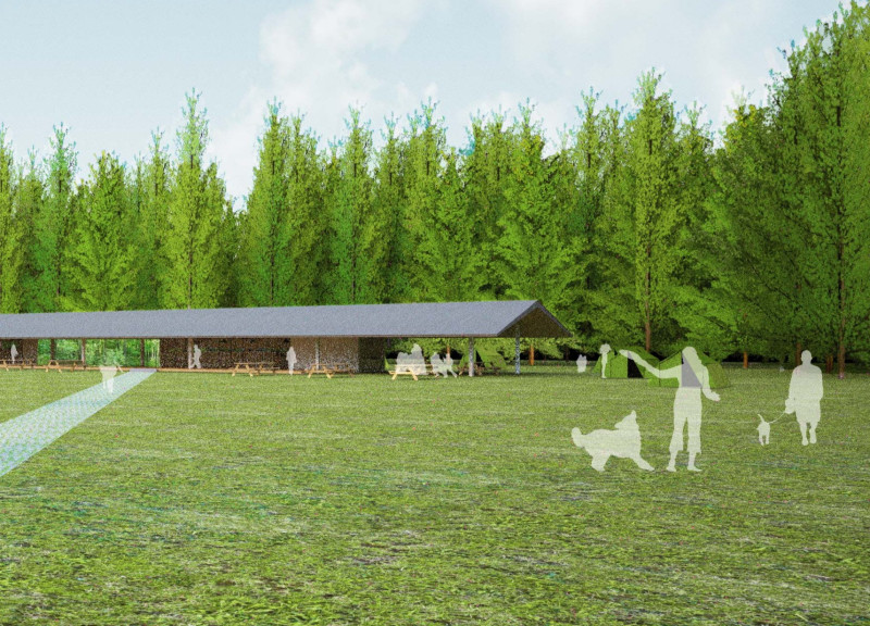 Gabled Roof Structure with Natural Light Emphasis in Rural Visitor Center