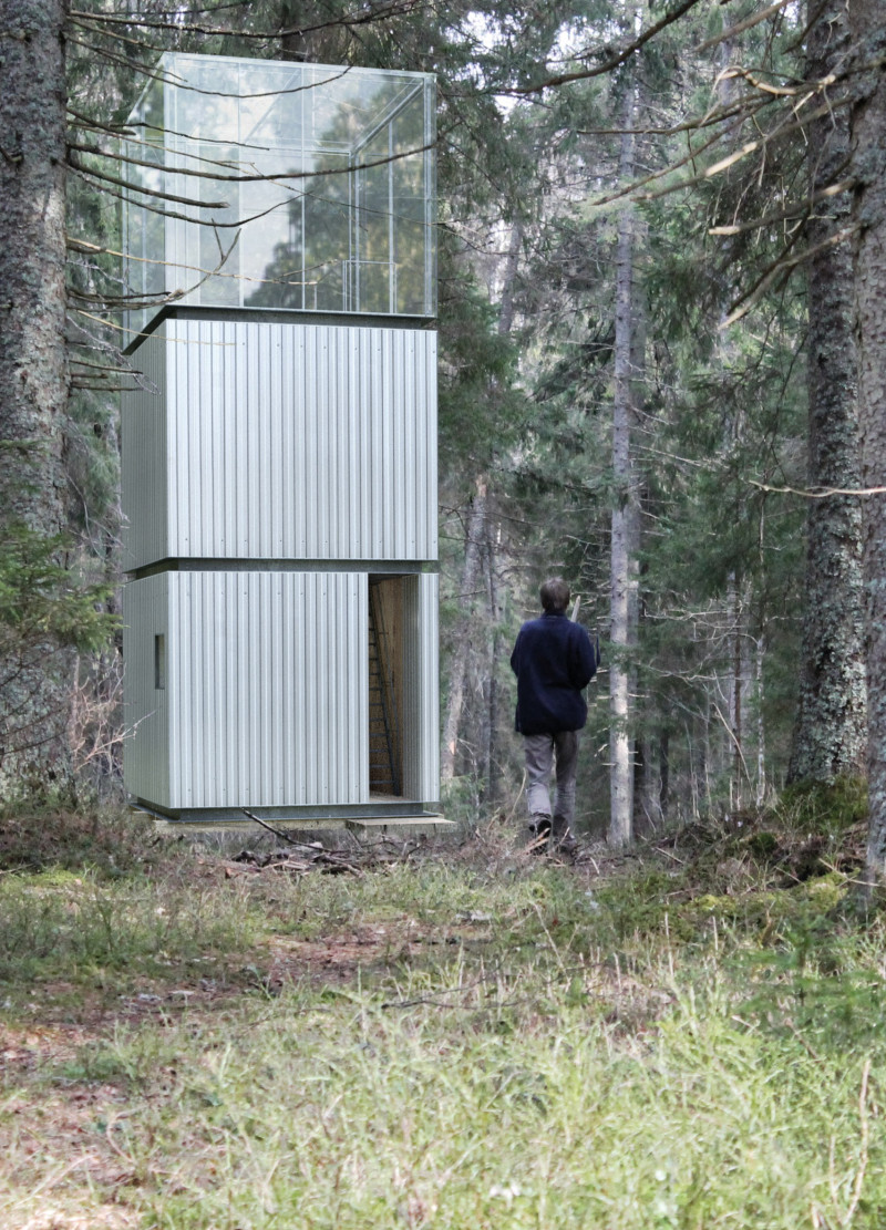 Vertical Sanctuary Crafted with U-Shaped Beams and Natural Wood Planks