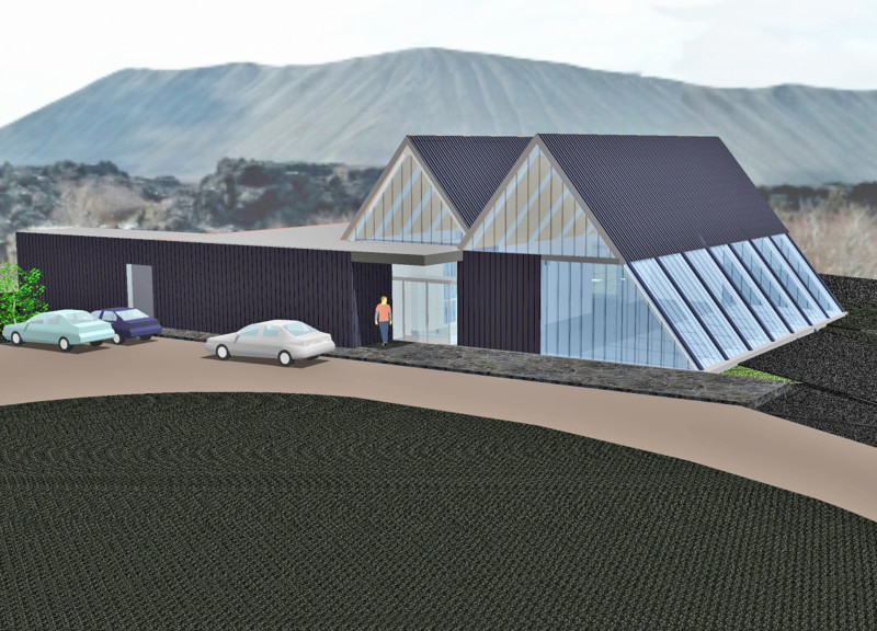 Dark Wood Panels and Gray Metal Roofs in a Visitor Center Within a Volcanic Landscape