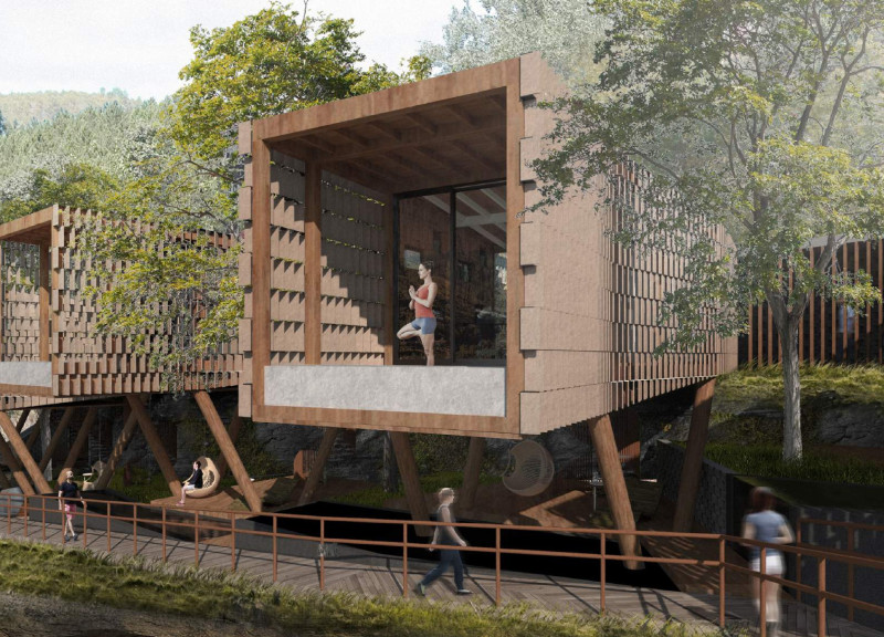 Elevated Cabins with Modular Panels Nestled in a Tranquil Landscape