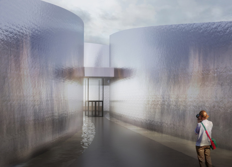 Curved Walls of Reinforced Concrete Framing a Sustainable Cinematic Experience