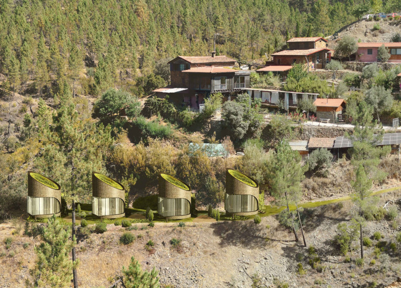 Stained Glass Retreat with Wood Chip Facades and Private Meditation Cabins