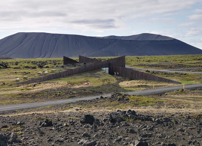 Underground Cinema with Concrete and Steel Integration