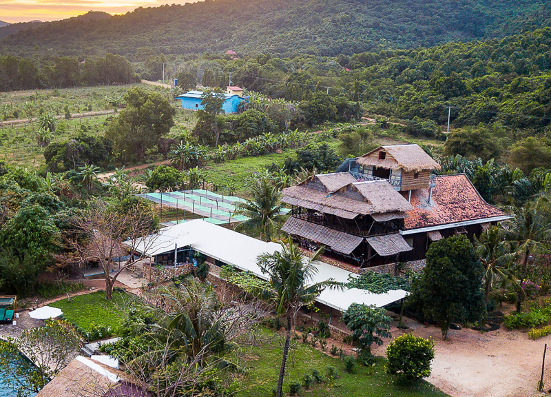 Charred Wooden Shingles and Reclaimed Materials Define Sustainable Community Spaces