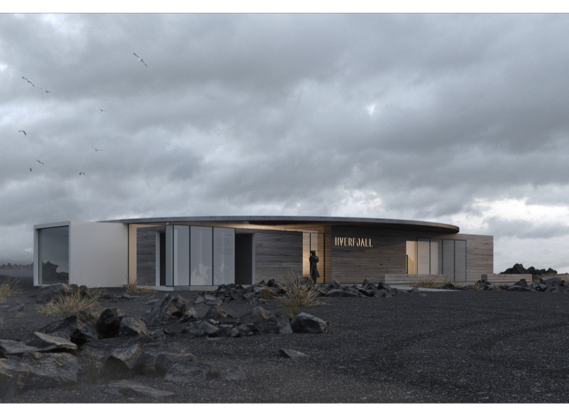 Panoramic Glazed Facade Framing Volcanic Stone Insights in a Crater-Inspired Retreat