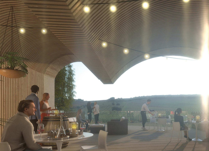 Carved Interiors Enhanced by a Thick Façade Overlooking Vineyards