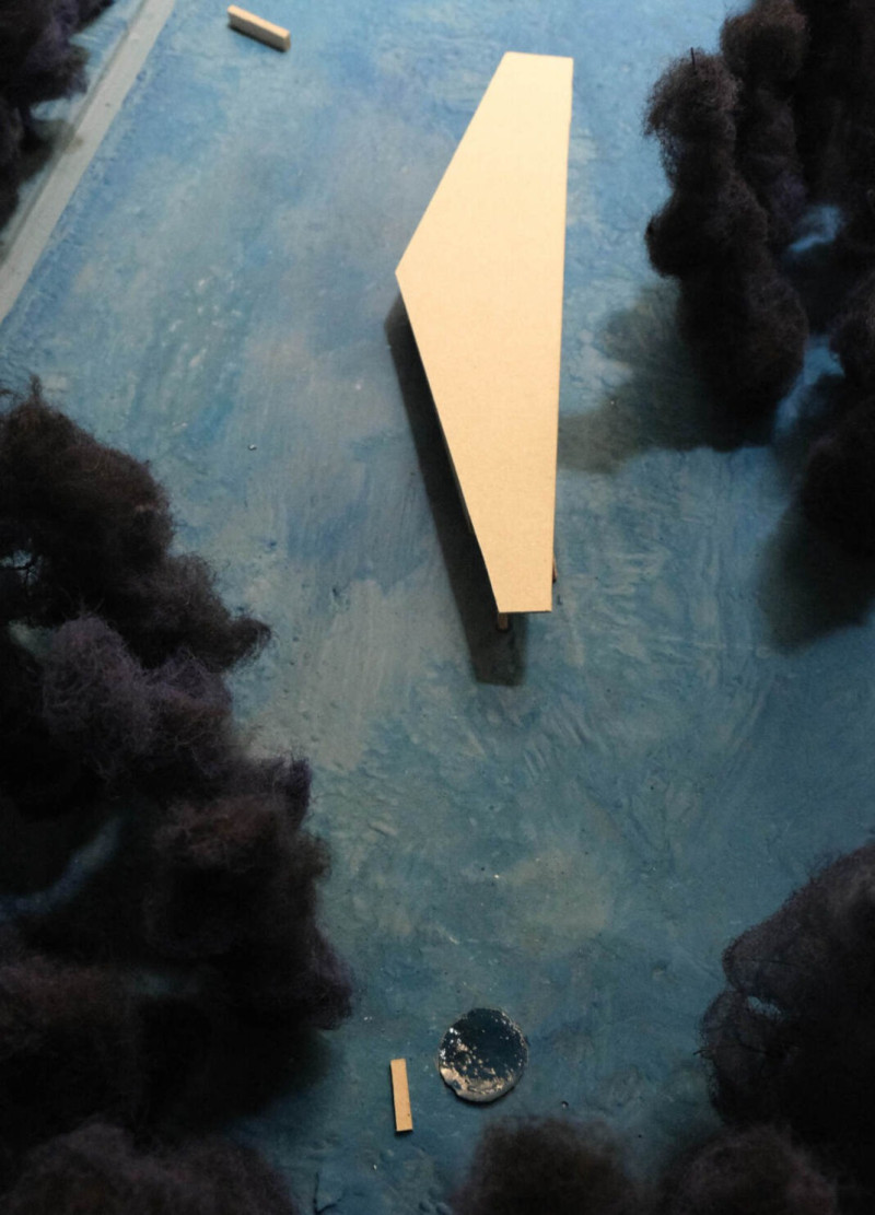 Reflective Pond with Cantilevered Niches in a Tranquil Forest Setting