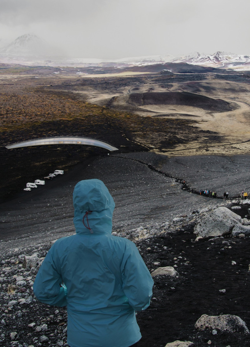 Curved Bio-Concrete Shelter Crafted with Translucent Polyester and Natural Timber for Community Gathering