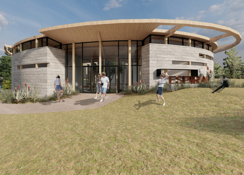 Central Rainwater Garden in a High Performance Metal and Reclaimed Wood Community Center