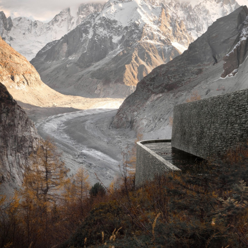 Melting Snow and Water Reflection Within a Rocky Landscape
