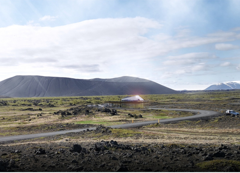 Curved Zinc Roof and Reflective Surfaces in a Community Gathering Space