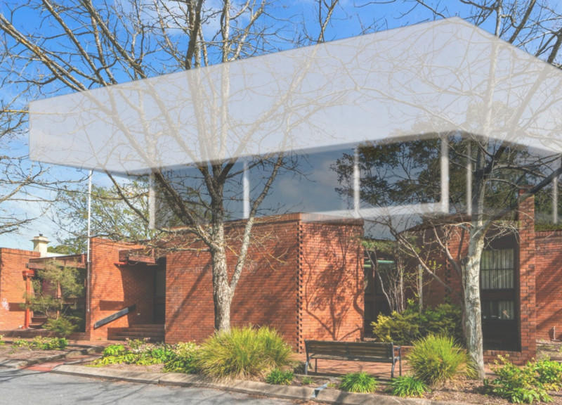Charred Wood Shingles and Precast Elements Crafting Flexible Community Spaces