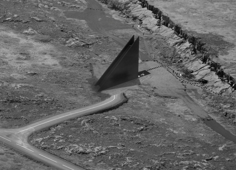 Volcanic Stone and Black Concrete Unite in a Cavernous Multi-Functional Space