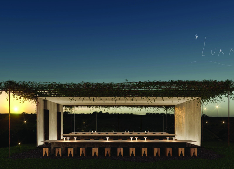 Reflective Walls and Earthy Tones in a Communal Space