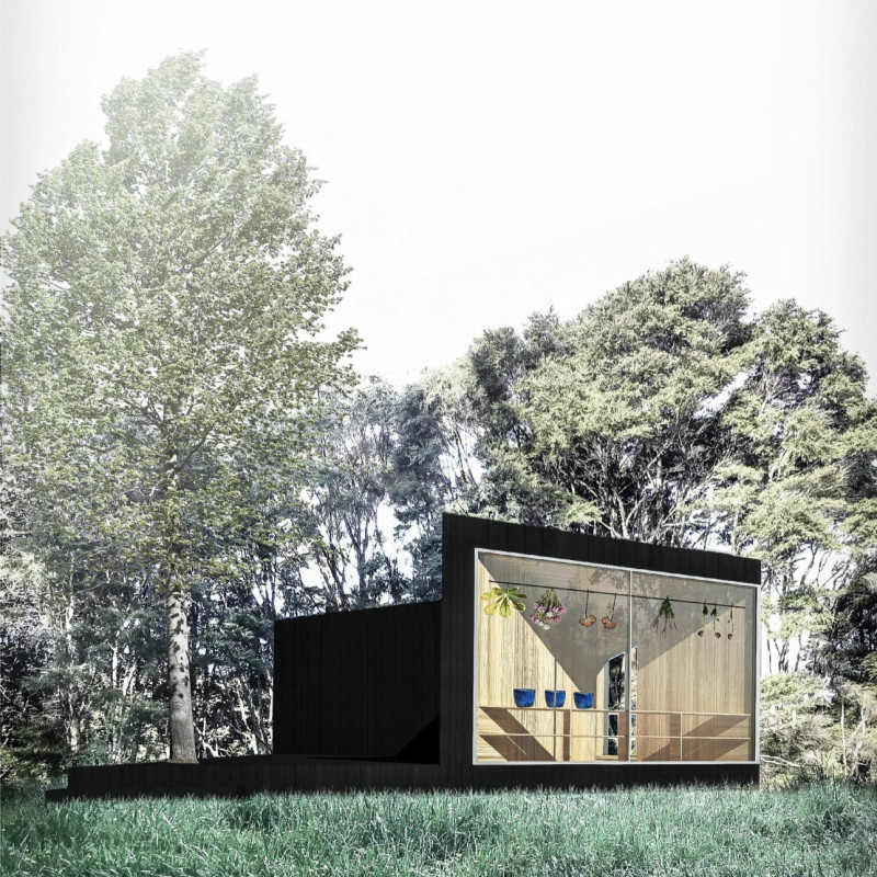 Charred Wooden Shingles and Expansive Glazing Define a Nestled Forest Retreat