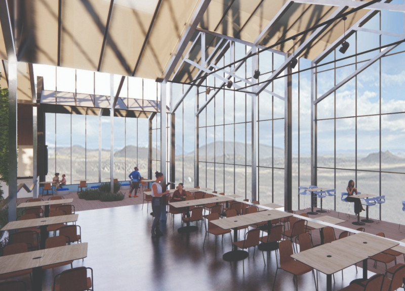 Glass Atrium with Burned Wood Veneer Embracing Community Agriculture