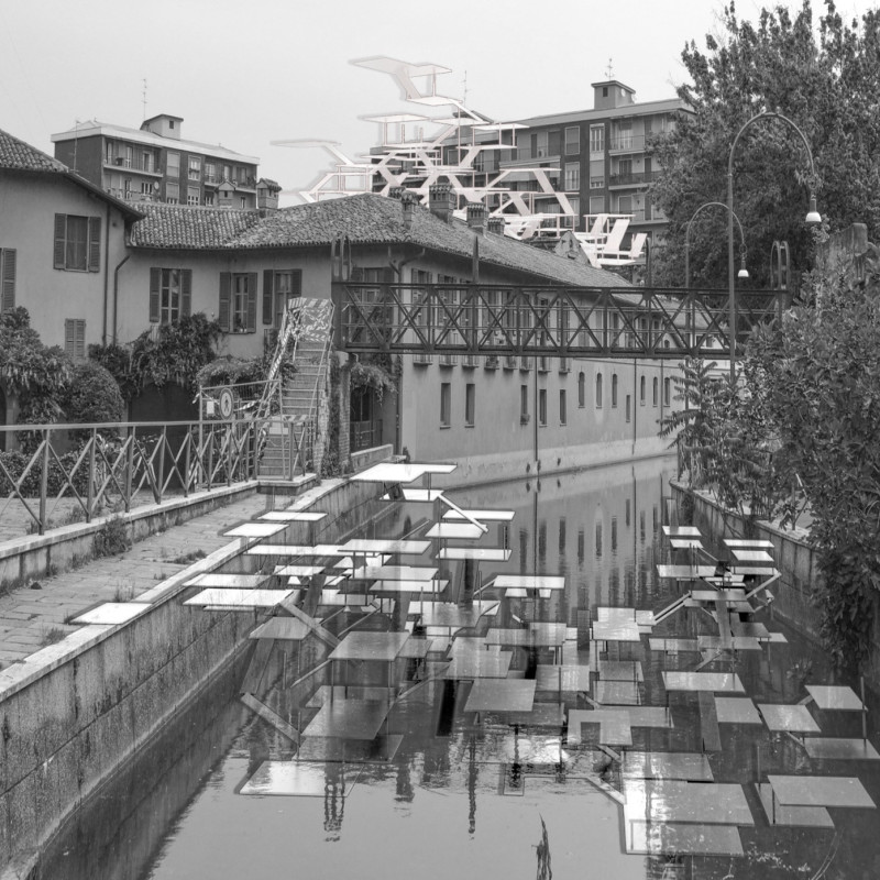 Elevated Canals Embracing Waterwheels and Permeable Pavers in Urban Revitalization