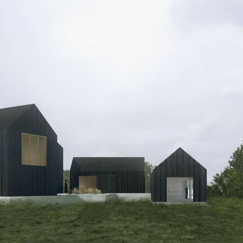 Central Garden Framed by Blackened Timber in a Family Artist Retreat