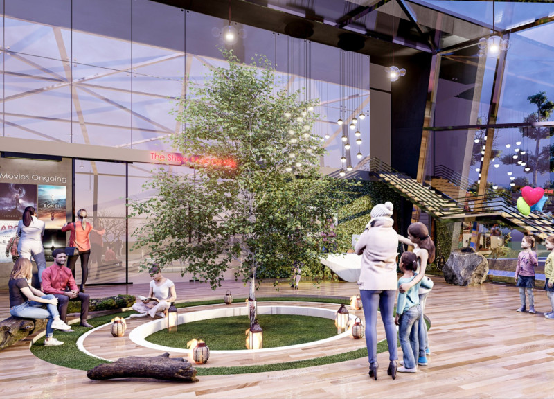 Seasonal Landscaping Under a Central Tree in a Sloped Pavilion