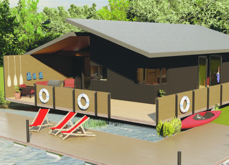 Pegboard Panels and Glulam Beams Create Flexible Living Along the River