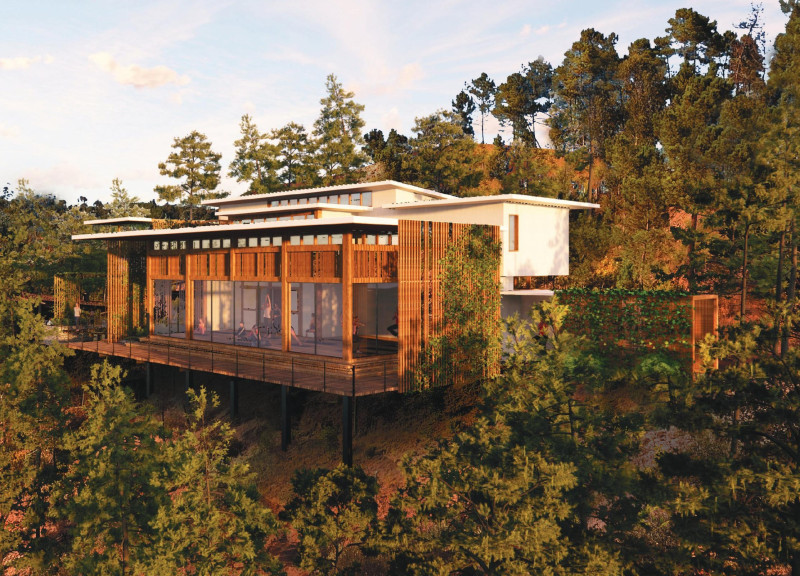 Charred Wooden Shingles and Cross-Laminated Timber Panels Define a Sustainable Retreat in a Hilly Landscape